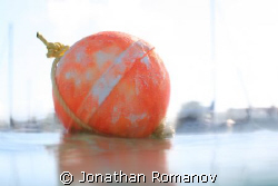 This photo is called "CALM BUOY " by Jonathan Romanov 